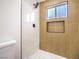 Bathroom featuring walk-in shower with neutral tiling and modern fixtures at 5239 Elgin Cir, Las Vegas, NV 89122