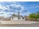 Charming single-story home boasts desert landscaping, a spacious driveway, and eye-catching curb appeal at 5239 Elgin Cir, Las Vegas, NV 89122