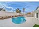 This stunning pool is ready for fun with privacy fence and diving board at 5239 Elgin Cir, Las Vegas, NV 89122