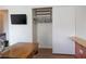 Bedroom with closet and TV at 5400 Tassara Way # 106, Las Vegas, NV 89108
