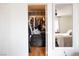 Open closet leading into bedroom, featuring ample storage space at 5400 Tassara Way # 106, Las Vegas, NV 89108