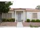 Charming single-story home with stucco siding and a tile roof. Covered entryway with decorative columns at 5400 Tassara Way # 106, Las Vegas, NV 89108