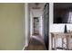 Hallway with storage leading to other rooms of the house at 5400 Tassara Way # 106, Las Vegas, NV 89108
