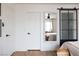Comfortable bedroom with decorative sliding glass door and built in mirror at 5400 Tassara Way # 106, Las Vegas, NV 89108