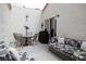 Private patio with outdoor seating, perfect for relaxation and entertaining at 5400 Tassara Way # 106, Las Vegas, NV 89108