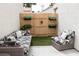 Cozy backyard patio featuring outdoor seating, decorative plants and wooden fence at 5400 Tassara Way # 106, Las Vegas, NV 89108