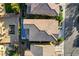 Aerial view of a home featuring a backyard pool and patio, nestled amongst lush landscaping at 5434 Fawn Chase Way, Las Vegas, NV 89135