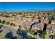 An aerial view of the neighborhood shows many houses and lush landscaping at 5434 Fawn Chase Way, Las Vegas, NV 89135