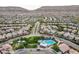 Wide aerial view showcasing a community surrounded by scenic mountains and a well-planned residential layout at 5434 Fawn Chase Way, Las Vegas, NV 89135