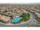 Aerial view of the community pool area and surrounding neighborhood homes, highlighting the community layout at 5434 Fawn Chase Way, Las Vegas, NV 89135