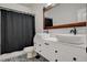 Bathroom with double sinks, granite countertop and subway tile backsplash at 5434 Fawn Chase Way, Las Vegas, NV 89135