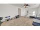 Upstairs bonus room featuring carpet flooring, ceiling fan, and gym equipment, perfect for exercise at 5434 Fawn Chase Way, Las Vegas, NV 89135