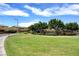 Community park with a large grass area and trees in front of buildings at 5434 Fawn Chase Way, Las Vegas, NV 89135