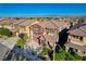 Exterior shot of a two-story home on a sunny day in a residential neighborhood at 5434 Fawn Chase Way, Las Vegas, NV 89135