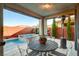 Covered patio with outdoor dining area and a view of the private pool and spa at 5434 Fawn Chase Way, Las Vegas, NV 89135