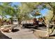 Neighborhood playground features a play structure, picnic table, and shady trees for a fun outing at 5434 Fawn Chase Way, Las Vegas, NV 89135