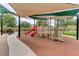 Covered playground with slides, climbing structures, and safety surfacing at 5434 Fawn Chase Way, Las Vegas, NV 89135