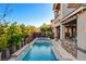Inviting pool and spa with manicured landscaping offers a tranquil outdoor retreat at 5434 Fawn Chase Way, Las Vegas, NV 89135