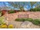 Ladera signage embedded in a wall with green bushes in the front and gravel on the ground at 5434 Fawn Chase Way, Las Vegas, NV 89135