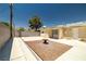 Backyard with large patio and gravel area, perfect for outdoor entertaining at 5817 Glen Eagles Ln, Las Vegas, NV 89108