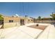 Backyard with large patio space and small gravel area at 5817 Glen Eagles Ln, Las Vegas, NV 89108