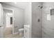 Modern bathroom with a sleek shower, updated fixtures, and stylish vanity at 5817 Glen Eagles Ln, Las Vegas, NV 89108