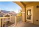 Balcony with white railings and a stucco archway at 5855 Valley Dr # 2161, North Las Vegas, NV 89031