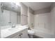 Bathroom with modern vanity, updated quartz counters, and shower-tub combination at 5855 Valley Dr # 2161, North Las Vegas, NV 89031