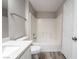 A full bathroom with quartz counters, shower and tub combination and neutral walls at 5855 Valley Dr # 2161, North Las Vegas, NV 89031