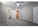 Bedroom features a ceiling fan and an attached bathroom at 5855 Valley Dr # 2161, North Las Vegas, NV 89031