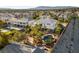 Stunning aerial view of a backyard oasis with pool, mature trees, and privacy at 6999 Stone Meadows Ave, Las Vegas, NV 89142