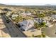 Scenic aerial view of a home and surrounding neighborhood with lush landscaping at 6999 Stone Meadows Ave, Las Vegas, NV 89142