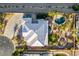 A landscape level view of a house that has a heart-shaped pool at 6999 Stone Meadows Ave, Las Vegas, NV 89142