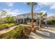 Expansive backyard with lush lawn, mature trees, and a patio area, perfect for outdoor living at 6999 Stone Meadows Ave, Las Vegas, NV 89142