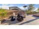 Backyard patio featuring a fire pit and seating, great for outdoor gatherings at 6999 Stone Meadows Ave, Las Vegas, NV 89142