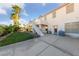 Spacious backyard with lawn and a staircase, offering ample space for outdoor activities and relaxation at 6999 Stone Meadows Ave, Las Vegas, NV 89142