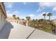 View from the large balcony, featuring palm trees and a desert landscape at 6999 Stone Meadows Ave, Las Vegas, NV 89142