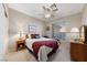 Cozy bedroom with a comfortable bed, neutral walls, and soft lighting for a relaxing ambiance at 6999 Stone Meadows Ave, Las Vegas, NV 89142