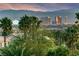 A cozy backyard offering beautiful views of the mountains and the Las Vegas cityscape at 6999 Stone Meadows Ave, Las Vegas, NV 89142