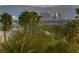 Backyard showcasing lush greenery and a view of the city skyline, including the Sphere at 6999 Stone Meadows Ave, Las Vegas, NV 89142