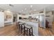 The kitchen has granite countertops, seating at the bar and stainless appliances at 6999 Stone Meadows Ave, Las Vegas, NV 89142