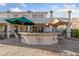 Backyard featuring an outdoor bar and kitchen area for entertaining at 6999 Stone Meadows Ave, Las Vegas, NV 89142