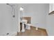 Bathroom with a pedestal sink, a frameless shower, and neutral-toned tile at 721 Carpenter Dr, Las Vegas, NV 89107