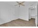 Bright bedroom with hardwood floors, ceiling fan, and closet at 721 Carpenter Dr, Las Vegas, NV 89107