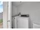Laundry room equipped with washer, dryer, and storage space at 721 Carpenter Dr, Las Vegas, NV 89107