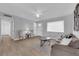 Inviting living space with neutral walls, wood-look floors, and comfortable seating at 721 Carpenter Dr, Las Vegas, NV 89107