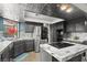 Updated kitchen featuring stainless steel appliances and a unique metallic ceiling at 7400 Amigo St, Las Vegas, NV 89123