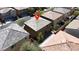 Aerial view of the house, showing a landscaped backyard and the surrounding neighborhood at 7931 Mineral Peak St, Las Vegas, NV 89166