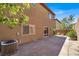 Spacious backyard with a concrete patio and minimal landscaping at 7931 Mineral Peak St, Las Vegas, NV 89166