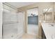 Bright bathroom with a large glass-enclosed shower, spacious countertop, and neutral tones for a clean, modern look at 7931 Mineral Peak St, Las Vegas, NV 89166